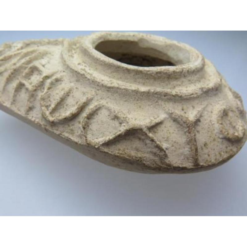 Byzantine oil lamp with the text: God shines his light on yo