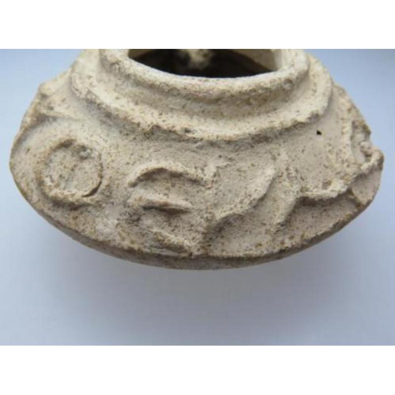 Byzantine oil lamp with the text: God shines his light on yo