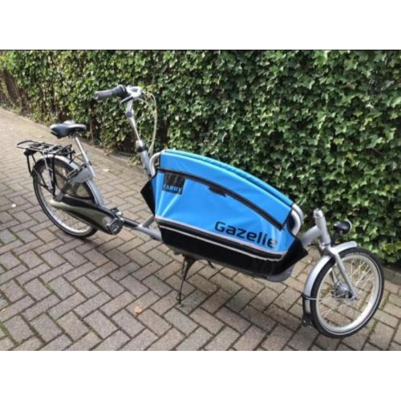 Cabby gazelle bakfiets met accessoires regenhoes zitje